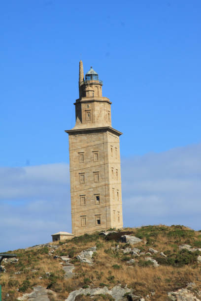 istock statue of breogan and lighthouse spain 1496970689