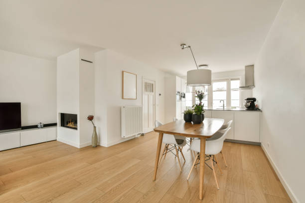istock a dining room with a wooden table and chairs 1496974887