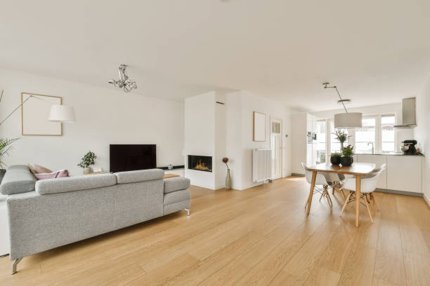 istock a living room with a couch and a dining table 1496974894