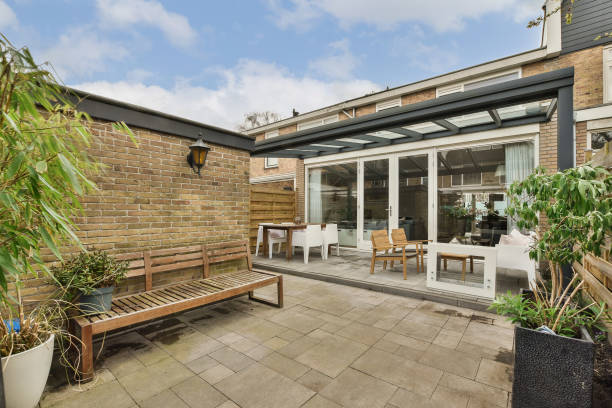 istock a patio with a bench and a sliding glass door 1496974916