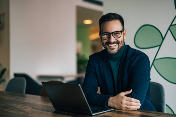 istock Happy businessman posing for the camera. 1496975974