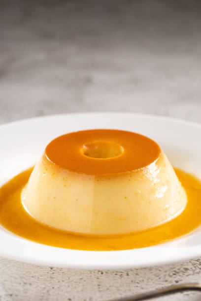 istock Condensed milk pudding. Brazilian traditional dessert. 1496977170