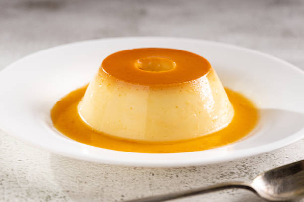 istock Condensed milk pudding. Brazilian traditional dessert. 1496977201