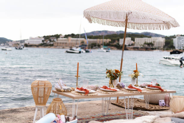 istock Luxury table set for meal next to the sea 1496977409