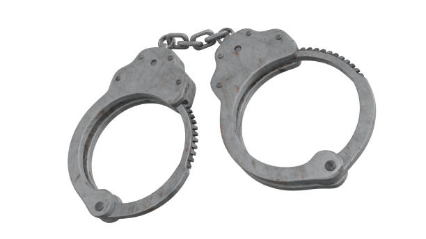 istock Hard metal handcuffs 3d render on white isolated background 1496978147