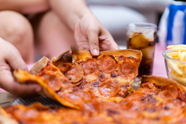 istock Asian fat women enjoy eating together. 1496981601