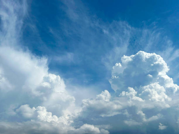 istock Blue sky with white clouds. Natural background. Close-up. Copy space. 1496983194