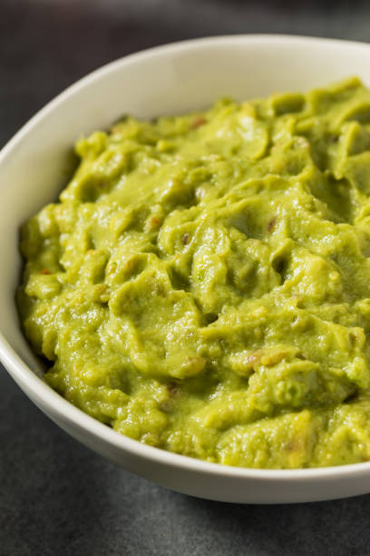 istock Organic Homemade Avocado Guacamole Dip 1496989724