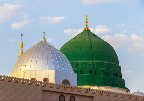 The famous green and silver domes of the Prophet's Mosque. Al Masjid an Nabawi