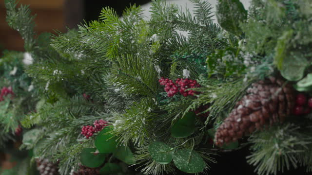 Pan along a real fir / pine Christmas garland