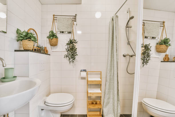 istock a white bathroom with a shower toilet and sink 1496993692