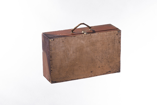 vintage wooden suitcase isolated on white background