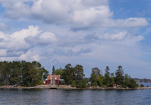 Scenic view of a small island in the archipelago during summer