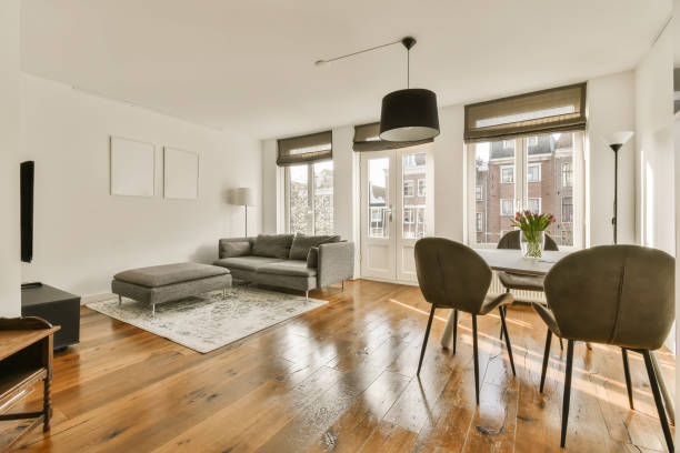istock a living room with a dining table and a couch 1496997535