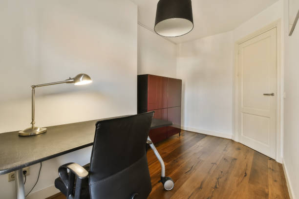 istock a room with a desk and a chair in it 1496997546