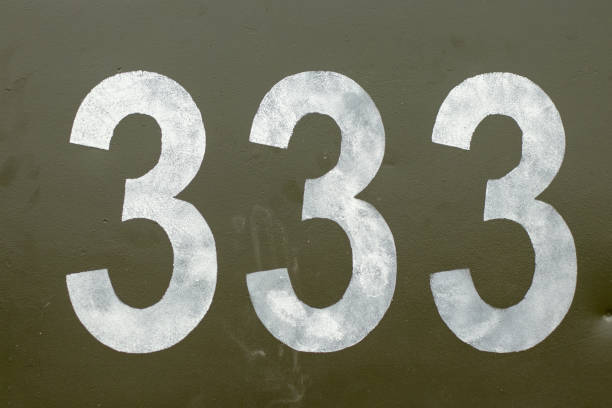 istock Three triples are written with white paint on a green background on tanks, numbers 1496997793