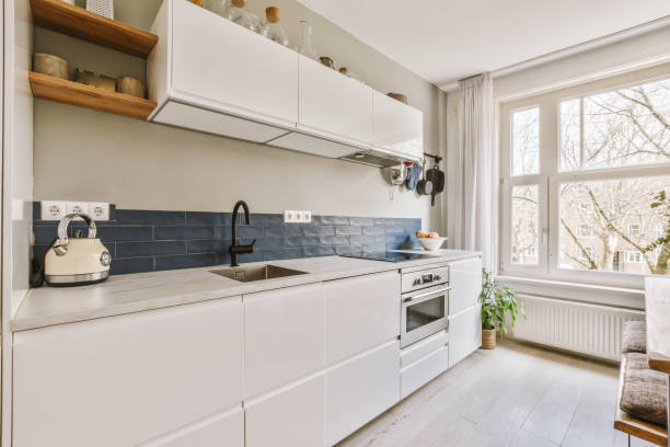 istock a kitchen with white cabinets and a sink 1497000715