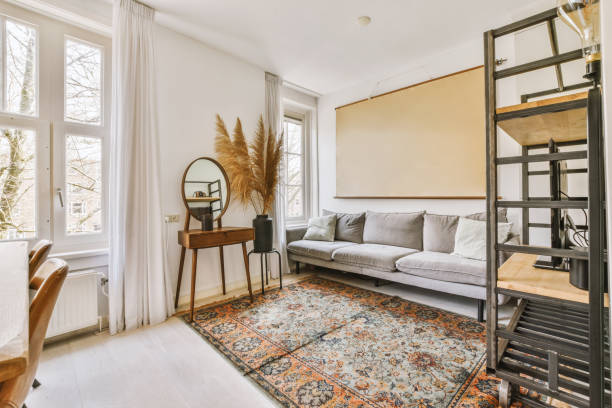 istock a living room with a couch and a rug 1497000723