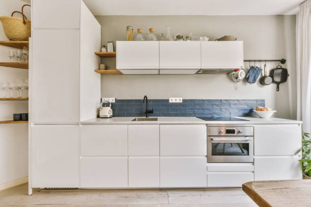 istock a kitchen with white cabinets and a sink 1497000726