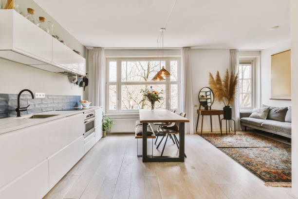 istock a living room with a kitchen and a dining room 1497000754