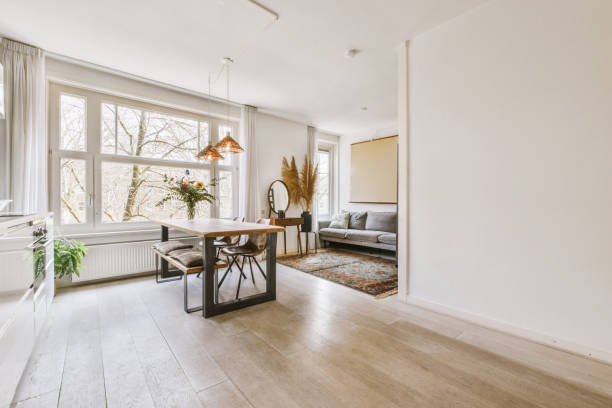 istock a living room with a large window and a table 1497000757