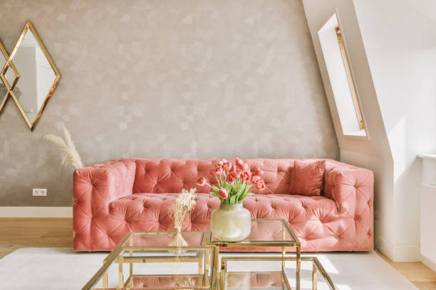 istock a living room with a pink couch and a table 1497000952
