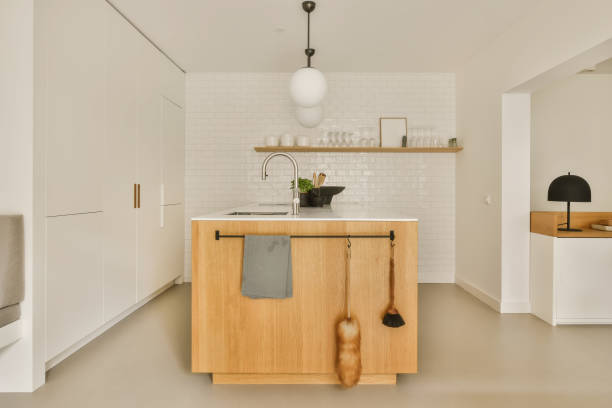 istock a kitchen with white cabinets and a wooden counter top 1497003751