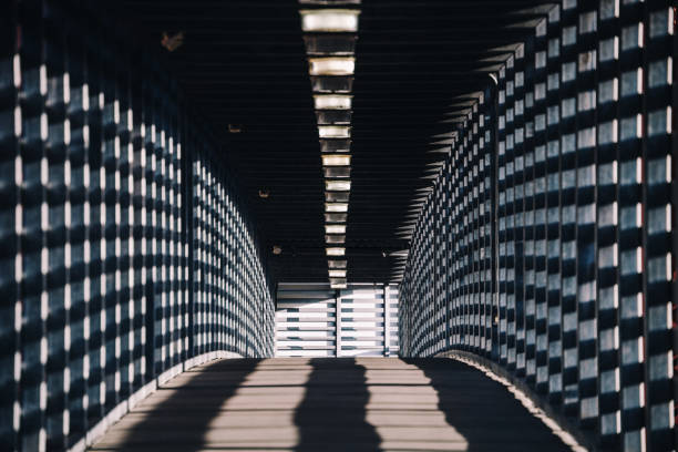 Shadows on pedestrian bridge. Kansas City, Missouri, USA