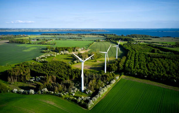 istock Agricultural field with wind turbine 1497007827
