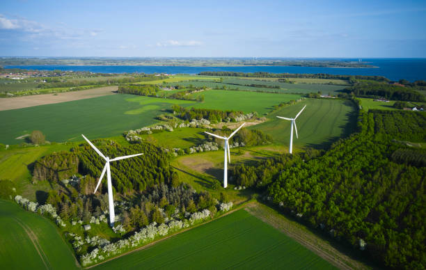 istock Agricultural field with wind turbine 1497007932