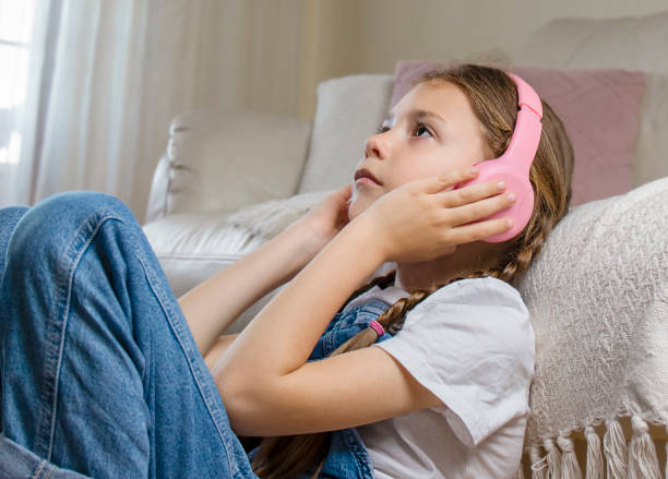istock Girl with headphones 1497015576
