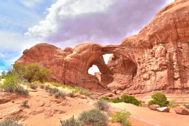 istock Arches National Park Utah Red Rocks Blue Sky with Clouds Double Arch 1497018241