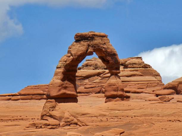 istock Arches National Park Utah Red Rocks Blue Sky with Clouds Delicate Arch 1497018363