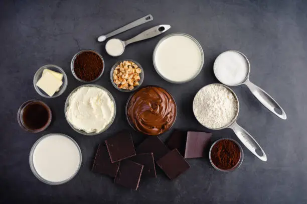 Hazelnut spread, dark chocolate, cream, and other cake ingredients