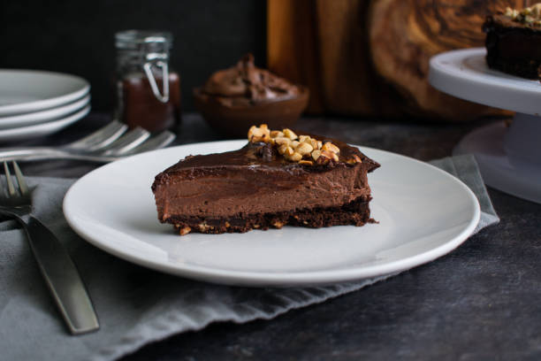 istock Slice of Chocolate Hazelnut Mousse Cake on a Plate 1497018789