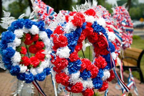 Memorial Day wreaths in a town park, USA remembrance and honor of war dead.
