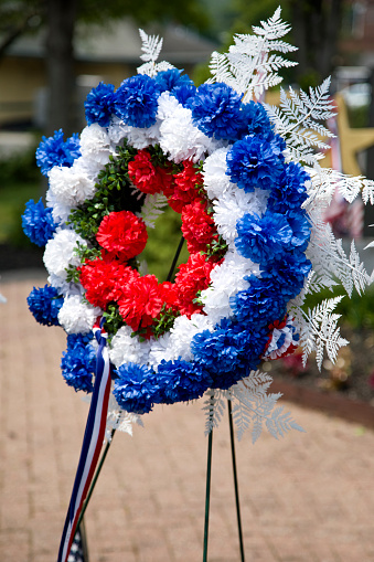 Memorial Day wreaths in a town park, USA remembrance and honor of war dead.