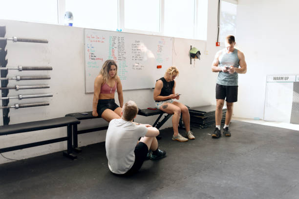 istock Group of friends taking a break after a workout 1497023354