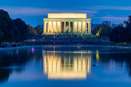 istock Illuminated Lincoln Memorial viewed across the pond at twilight 1497031641