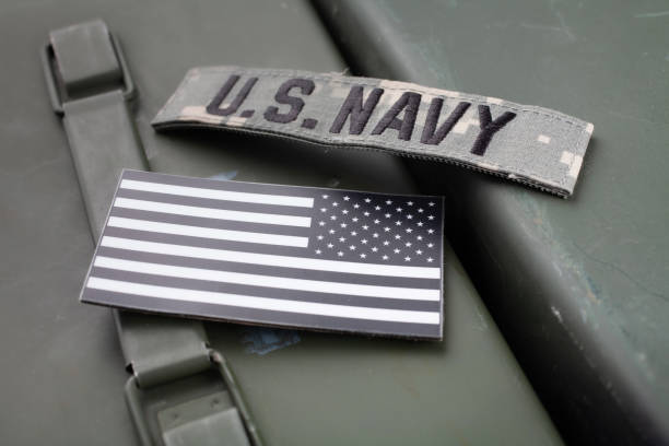 istock U.S. Navy Branch Tape with national US flag patch on green ammo can 1497042478