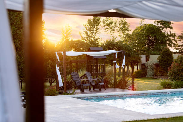 istock Swimming pool and solarium at hostel 1497057609