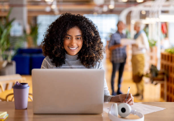 istock Businesswoman working on her computer at the office 1497057640