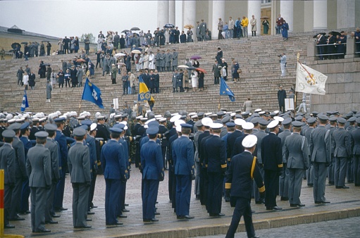 Helsinki, Finland, 1986. Finnish military officer on Senate Square on National Day in Helsinki. Also: government officials and guests.