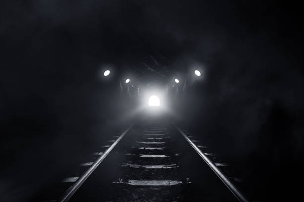 istock 3D Rendering Old tunnel of the railway scary at night 1497065926