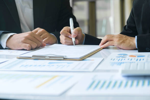 istock Business man sign a contract investment professional document agreement. 1497066153