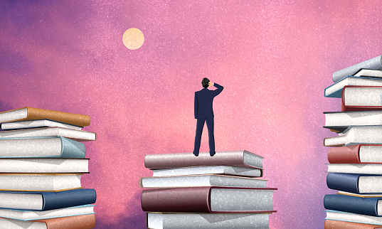 Businessman Standing on Books Rack Thinking and Looking to The Sky Sunset. Business Person concept of Brainstorming and Self learning. Generative AI