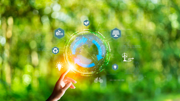 istock green energy concept help reduce global warming.Hand holding natural background light bulb on green leaf with clean energy icon around it. Carbon dioxide emission in industry zero carbon concept. 1497067453