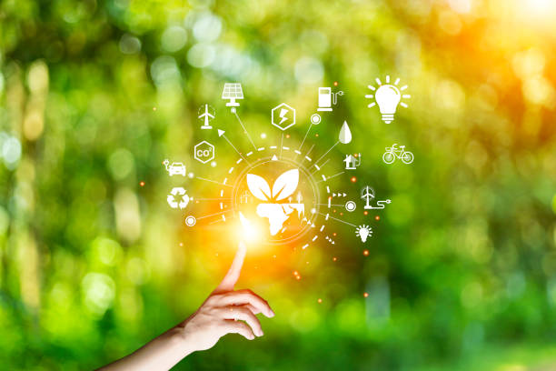 istock green energy concept help reduce global warming.
Hand holding natural background light bulb on green leaf with clean energy icon around it. Carbon dioxide emission in industry zero carbon concept. 1497068157