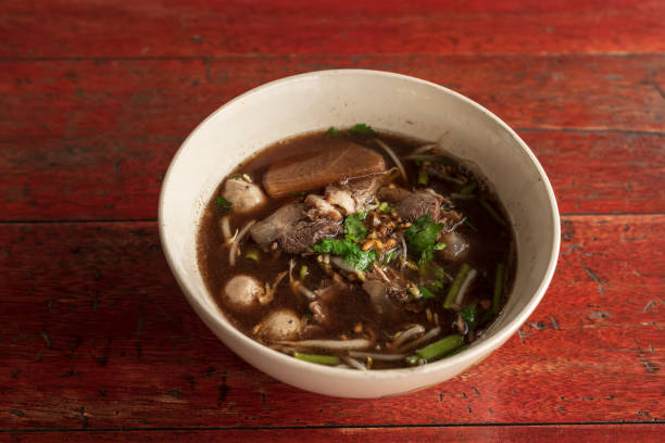 istock Noodles with pork with soup in Thai style. 1497069706