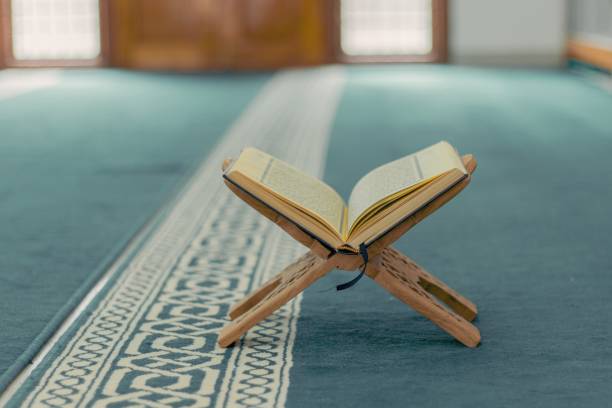 istock Holy Quran kept in the Mosque. Islamic background. 1497073527